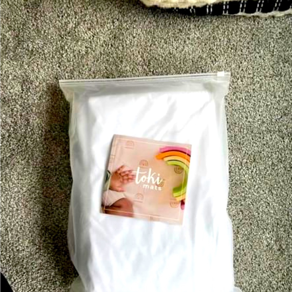 Toki playmat waterproof cover- brand new in packaging.